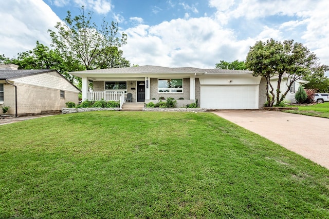 ranch-style house featuring an attached garage, a front yard, covered porch, and driveway