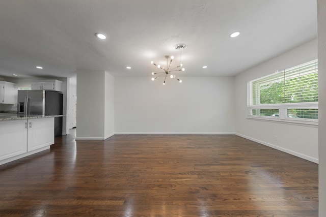 7024 Irongate Ln, Dallas, TX 75214 - unfurnished living room featuring a chandelier, recessed lighting, and dark wood-style floors