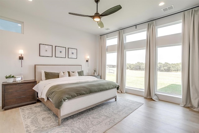 bedroom with visible vents, recessed lighting, light wood-style floors, and ceiling fan