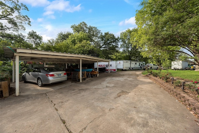 view of vehicle parking featuring driveway