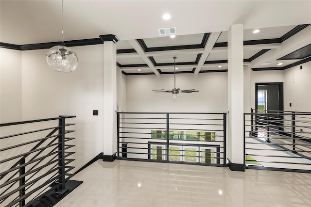 corridor with baseboards, visible vents, an upstairs landing, coffered ceiling, and ornamental molding