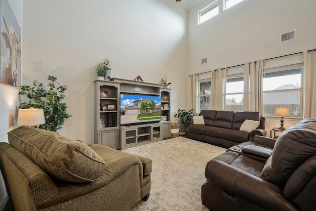 503 Saddle Club Way, Princeton, TX 75407 - living room featuring visible vents and a towering ceiling