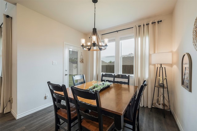 503 Saddle Club Way, Princeton, TX 75407 - dining area with a chandelier, baseboards, and dark wood-style flooring