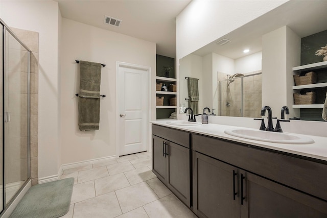 503 Saddle Club Way, Princeton, TX 75407 - full bath featuring tile patterned floors, visible vents, a sink, and a stall shower