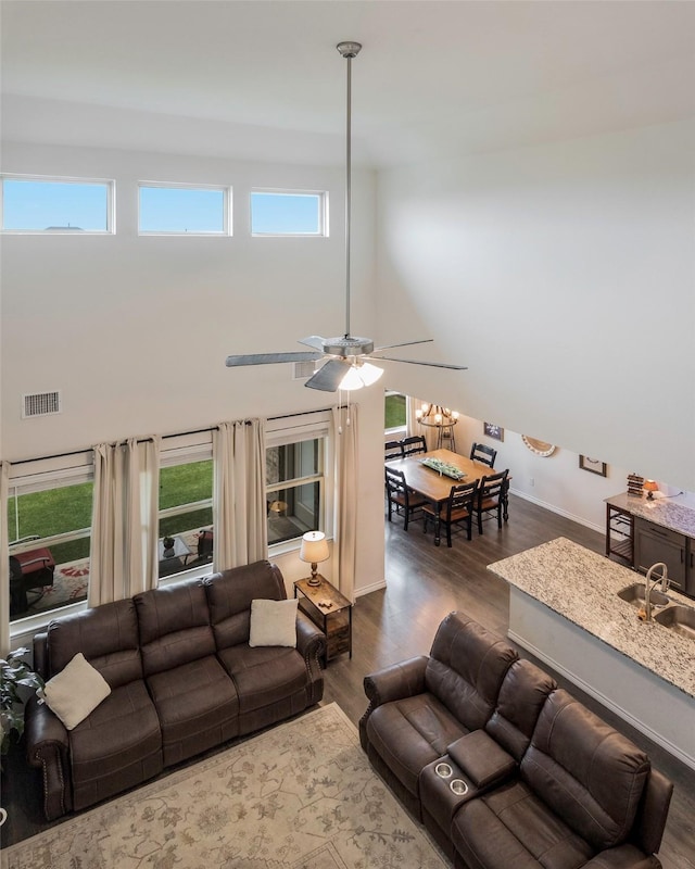 503 Saddle Club Way, Princeton, TX 75407 - living area with baseboards, visible vents, dark wood-type flooring, and a healthy amount of sunlight