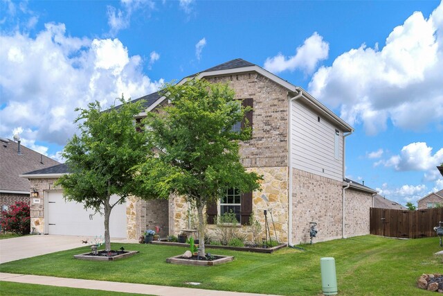 503 Saddle Club Way, Princeton, TX 75407 - view of front of house with a front lawn, concrete driveway, fence, brick siding, and a garage