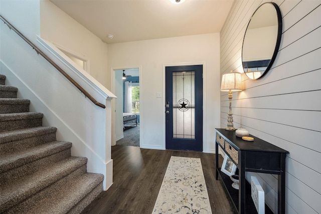 503 Saddle Club Way, Princeton, TX 75407 - entryway featuring stairway, wood walls, wood finished floors, and baseboards