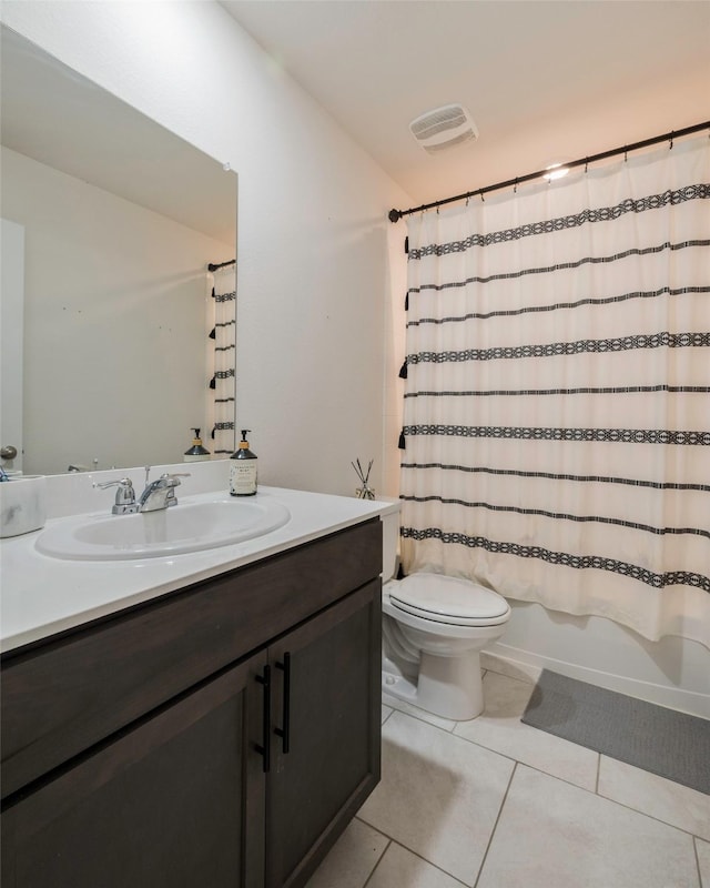 503 Saddle Club Way, Princeton, TX 75407 - bathroom with tile patterned floors, vanity, visible vents, toilet, and shower / bath combo with shower curtain