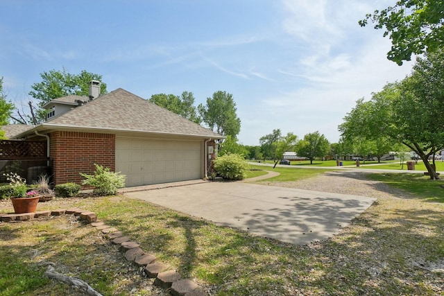 view of property exterior with a lawn, brick siding, a chimney, and a shingled roof
