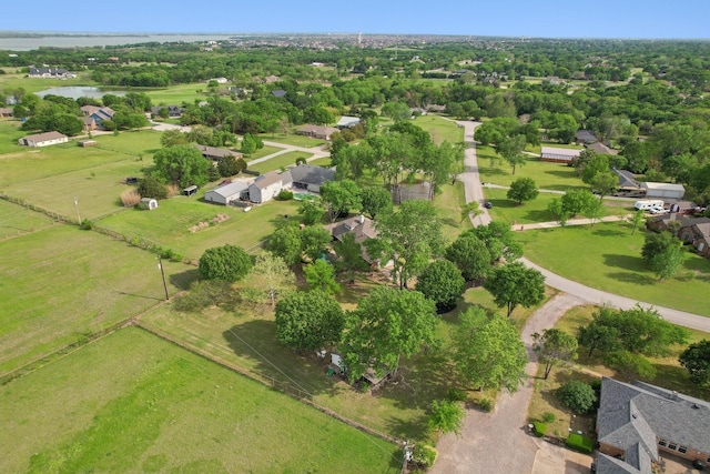 birds eye view of property with a residential view and a water view