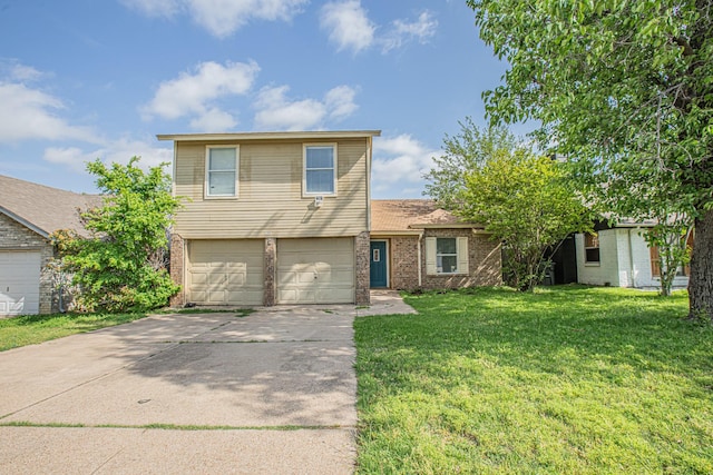 tri-level home featuring brick siding, an attached garage, driveway, and a front yard