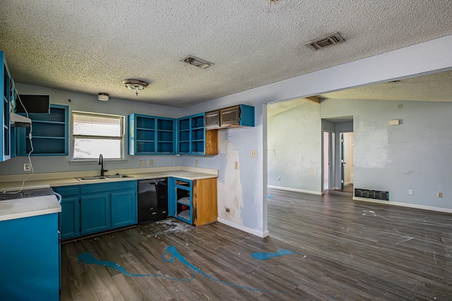 kitchen featuring dishwasher, open shelves, a sink, and visible vents