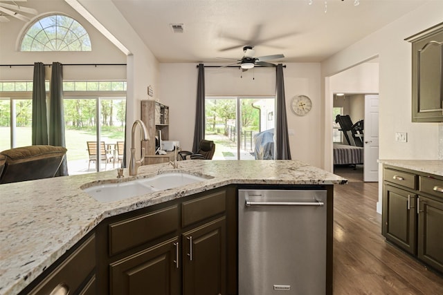 kitchen featuring a sink, open floor plan, dishwasher, ceiling fan, and visible vents