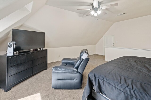 bedroom with baseboards, visible vents, carpet, lofted ceiling, and ceiling fan