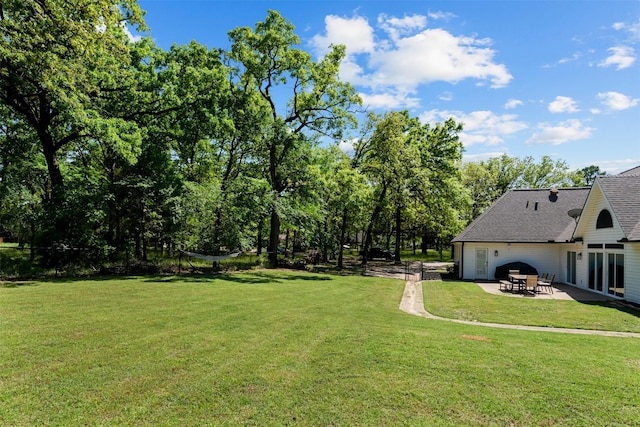 view of yard with a patio area