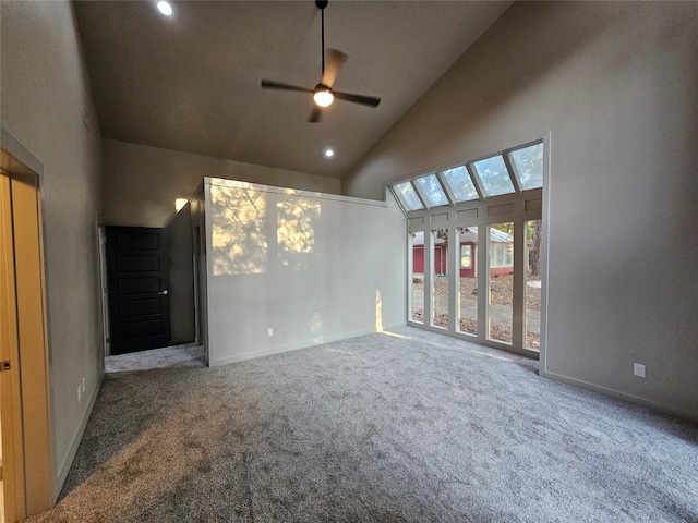 carpeted empty room featuring a ceiling fan, baseboards, high vaulted ceiling, and recessed lighting