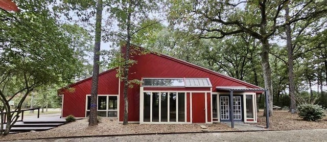 view of outdoor structure featuring french doors