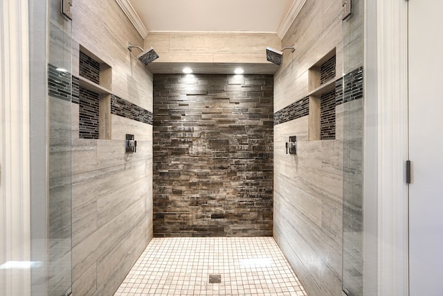 bathroom featuring ornamental molding and a stall shower