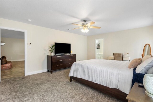 bedroom with ceiling fan, carpet floors, and baseboards