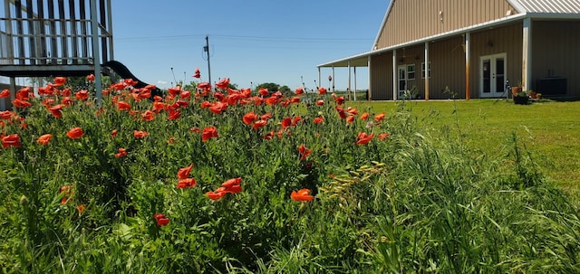 view of yard featuring french doors