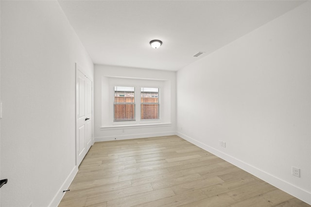 301 E Cheyenne Mountain Cor, Ovilla, TX 75154 - spare room featuring light wood finished floors and baseboards