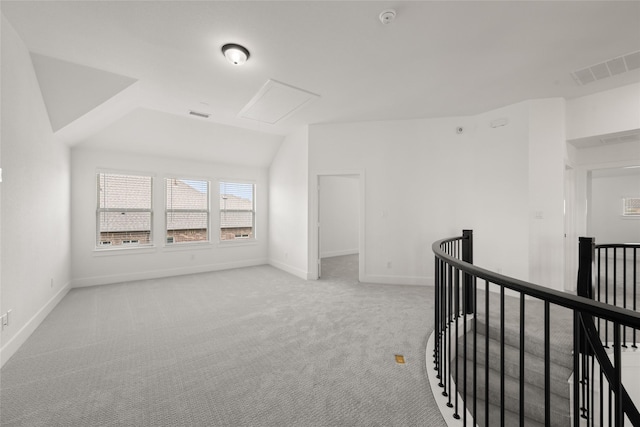 301 E Cheyenne Mountain Cor, Ovilla, TX 75154 - bonus room featuring attic access, light colored carpet, baseboards, and vaulted ceiling