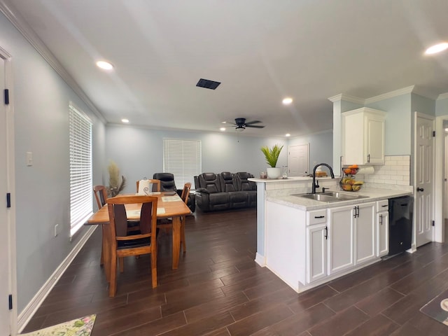 2631 Lillian St, Shreveport, LA 71103 - kitchen with a sink, recessed lighting, black dishwasher, a ceiling fan, and crown molding