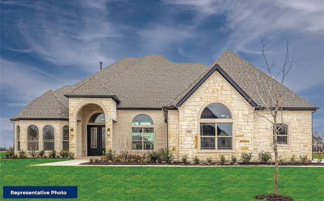 431 Broadmoor, Ovilla, TX 75154 - french provincial home with stone siding, roof with shingles, a front lawn, and brick siding