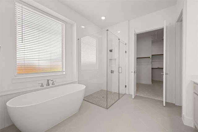 431 Broadmoor, Ovilla, TX 75154 - full bathroom featuring a shower stall, a soaking tub, tile patterned flooring, vanity, and recessed lighting