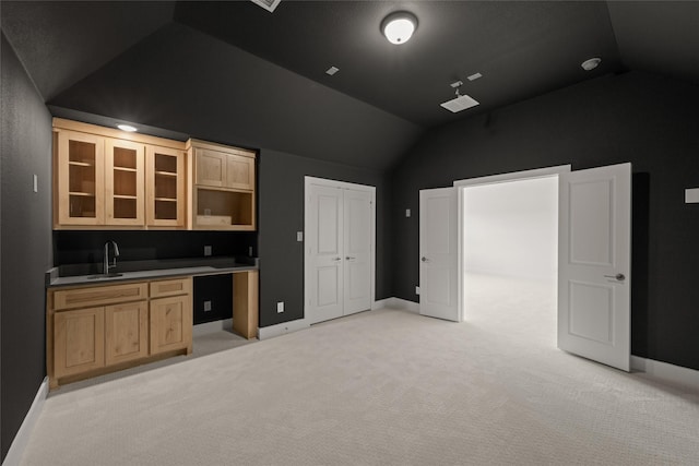 431 Broadmoor, Ovilla, TX 75154 - bar with lofted ceiling, light colored carpet, a sink, and baseboards