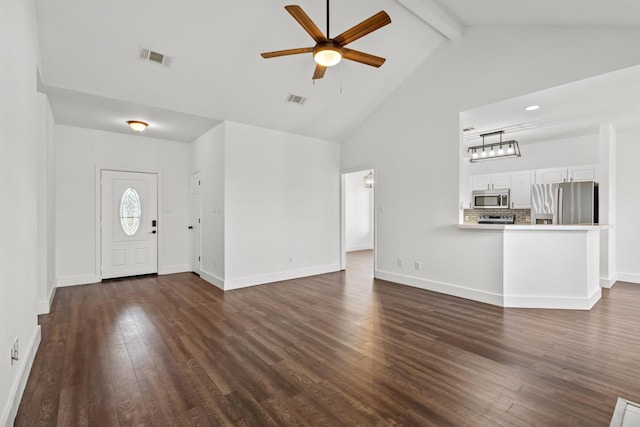 704 Katy Ln, Whitewright, TX 75491 - unfurnished living room featuring ceiling fan, beam ceiling, high vaulted ceiling, dark wood-style flooring, and baseboards