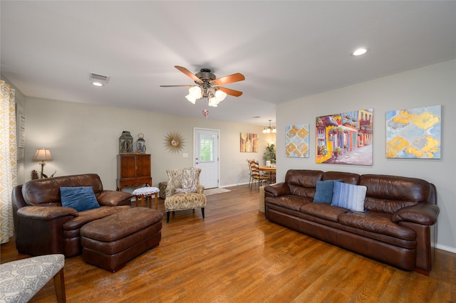 310 Otis St, Whitesboro, TX 76273 - living room featuring wood finished floors, a ceiling fan, baseboards, and recessed lighting