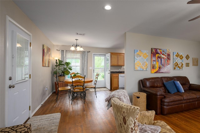 310 Otis St, Whitesboro, TX 76273 - living room featuring wood finished floors, a chandelier, a ceiling fan, baseboards, and recessed lighting