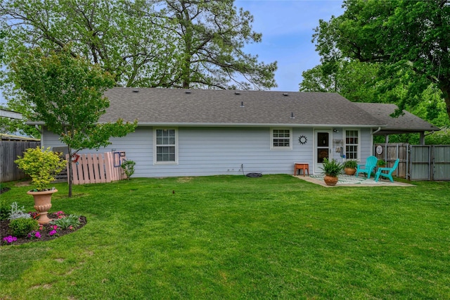 310 Otis St, Whitesboro, TX 76273 - back of property with a patio and roof with shingles