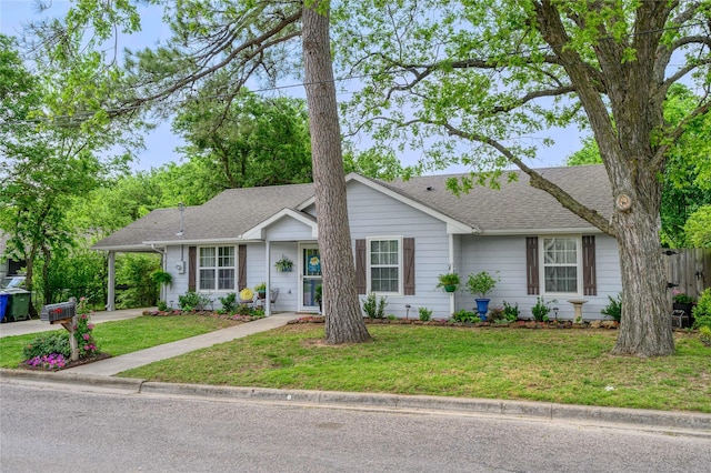 310 Otis St, Whitesboro, TX 76273 - single story home featuring a shingled roof, a front lawn, an attached carport, and concrete driveway