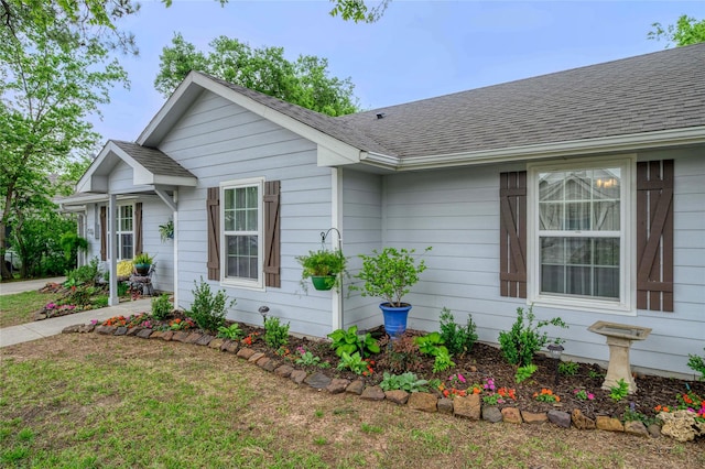 310 Otis St, Whitesboro, TX 76273 - view of home's exterior featuring a shingled roof