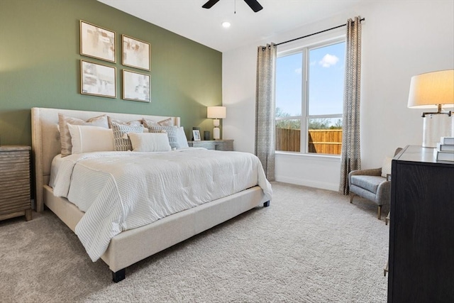 carpeted bedroom with a ceiling fan, baseboards, and recessed lighting