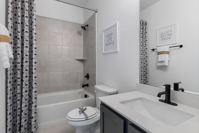 full bath with shower / bath combo, vanity, and toilet
