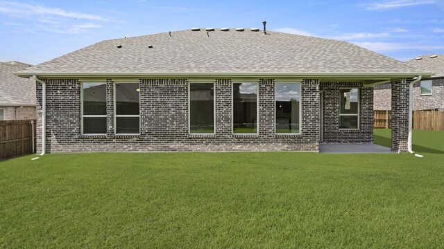 776 Tawny Turn, Lavon, TX 75166 - back of property featuring brick siding and roof with shingles