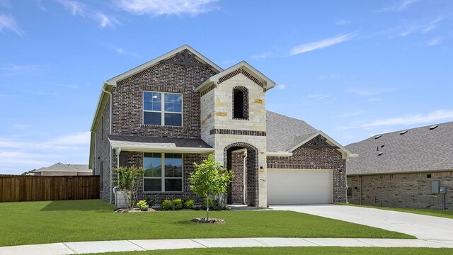 776 Tawny Turn, Lavon, TX 75166 - kitchen with appliances with stainless steel finishes, green cabinetry, light wood-style flooring, pendant lighting, and a breakfast bar