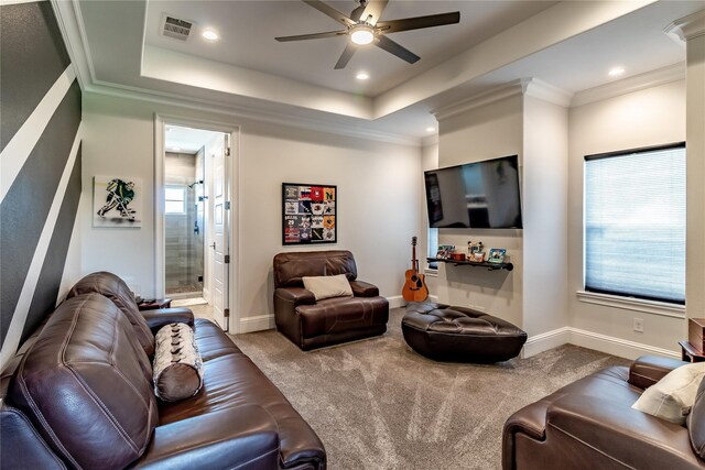 carpeted bedroom with a raised ceiling, a ceiling fan, recessed lighting, and visible vents