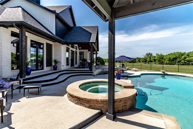 back of property with a gazebo, an outdoor pool, a patio area, french doors, and a yard