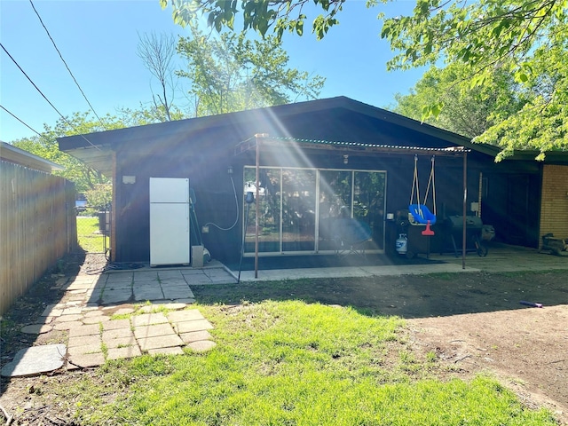 view of outdoor structure with fence
