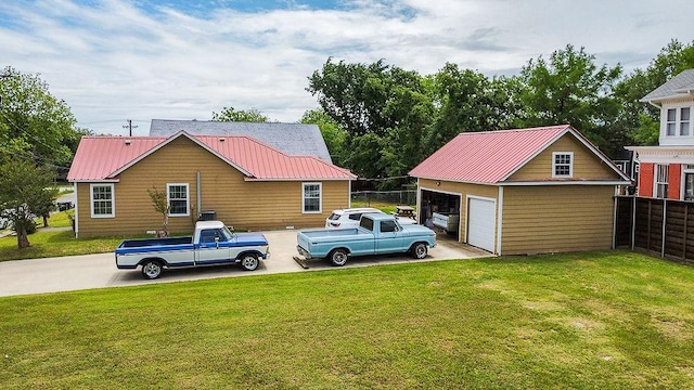 2617 Bourland St, Greenville, TX 75401 - view of yard featuring a detached garage and an outdoor structure