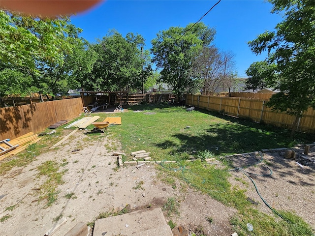 view of yard featuring a fenced backyard