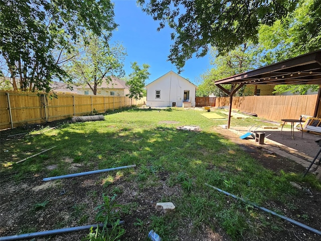 view of yard featuring a fenced backyard