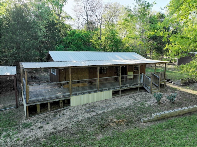 exterior space with metal roof