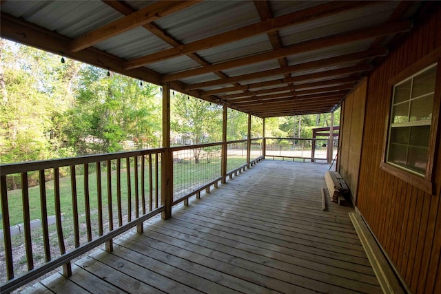 wooden deck with a yard