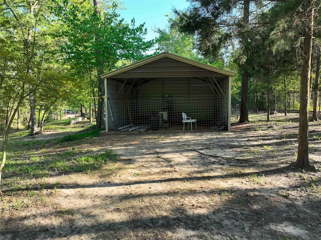 view of outbuilding featuring a detached carport