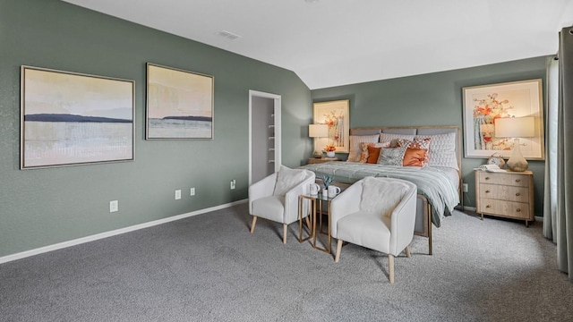 carpeted bedroom with baseboards and visible vents